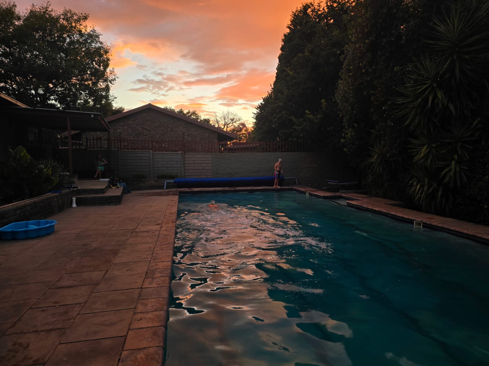 beautiful sunset overlooking the splashmates outdoor swimming pool